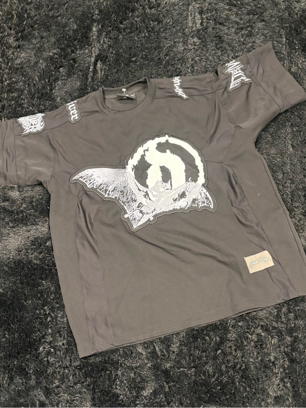 Men's Black Graphic Short-Sleeve Jersey with White Bat Emblem